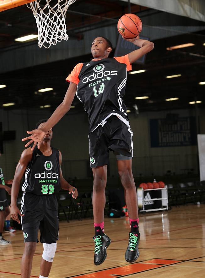 Derrick Jones goes up for a dunk during the Adidas Nations camp on Aug. 4, 2014, in Long Beach, Calif. Jones, a small forward ranked No. 42 in the class of 2015 by Rivals, committed to UNLV on Thursday, Nov. 13, 2014.
