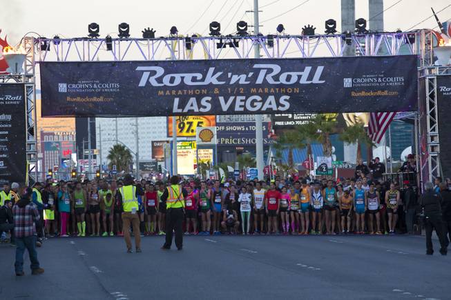 Elite runners line up at the starting line of the 2014 Rock n Roll Marathon Las Vegas, Sunday Nov. 16, 2014.
