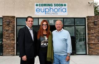 Spokesman Jim Ferrence, owner Deanne Lamb and owner Joe Lamarca of Euphoria Wellness, soon to be a medical marijuana dispensary. They hosted an open house Wednesday, Nov. 19, 2014.