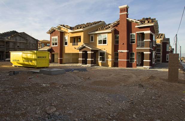Construction continues on the Somerset Hills Apartments, 10695 S. Dean Martin Drive, Sunday, Dec. 7, 2014.