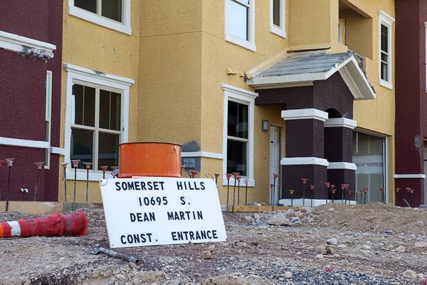 Construction continues on the Somerset Hills Apartments, 10695 S. Dean Martin Drive, Sunday, Dec. 7, 2014.