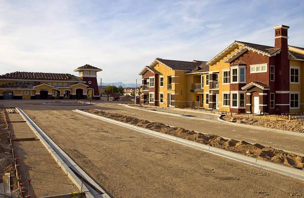 Construction continues on the Somerset Hills Apartments, 10695 S. Dean Martin Drive, Sunday, Dec. 7, 2014.