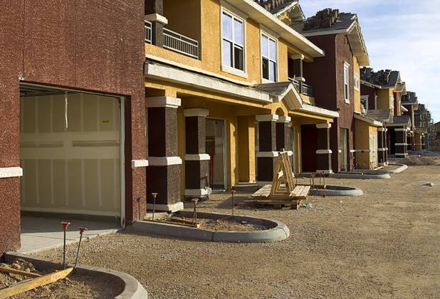 Construction continues on the Somerset Hills Apartments, 10695 S. Dean Martin Drive, Sunday, Dec. 7, 2014.