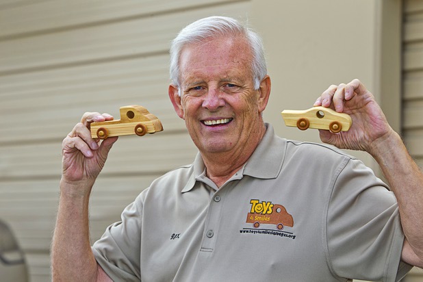 Founder Rex Doty poses at the Toys 4 Smiles workshop Monday, Dec. 8, 2014. The nonprofit organization started as a wood club in 2006 and will soon produce their 200,000th toy, Doty said.