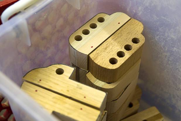 Toy cars are shown in a basket at the Toys 4 Smiles workshop Monday, Dec. 8, 2014. The nonprofit organization started as a wood club in 2006 and will soon produce their 200,000th toy, said founder Rex Doty.