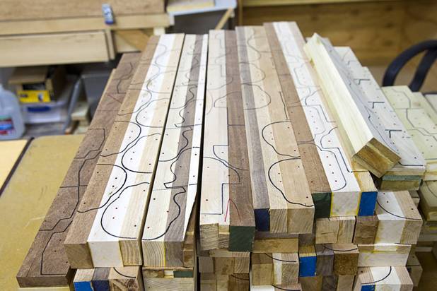 Boards are ready to be cut into toy cars at the Toys 4 Smiles workshop Monday, Dec. 8, 2014. The nonprofit organization started as a wood club in 2006 and will soon produce their 200,000th toy, said founder Rex Doty.