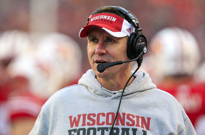In this Nov. 29, 2014, file photo, Wisconsin coach Gary Andersen watches during the first half of an NCAA college football game against Minnesota in Madison, Wis. Andersen is leaving Wisconsin to take head coaching job at Oregon State.
