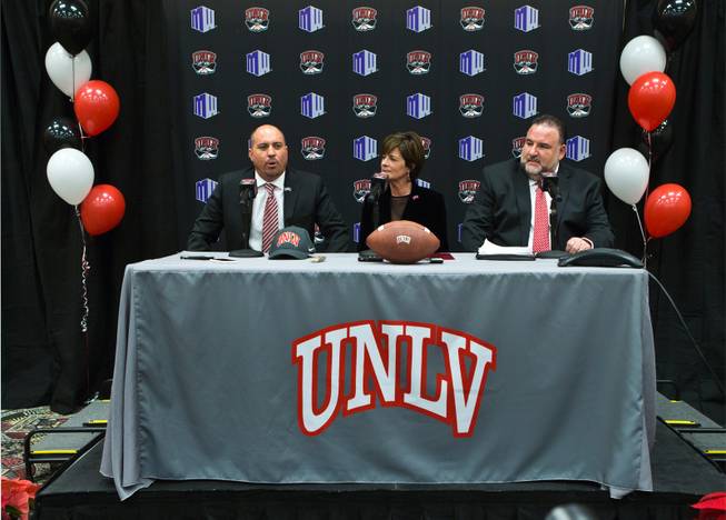 Tony Sanchez speaks after being announced as the new UNLV football team head coach by athletic director Tina Kunzer-Murphy and director of media relations  Mark Wallington in the Stan Fulton Building ballroom on Thursday, December 11, 2014.