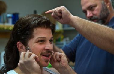 “Rock of Ages” at the Venetian star Mark Shunock has his mullet applied by hair, wig and makeup supervisor Robin Lee as part of preparations for the show Tuesday, Dec. 16, 2014, at the Venetian Theater.