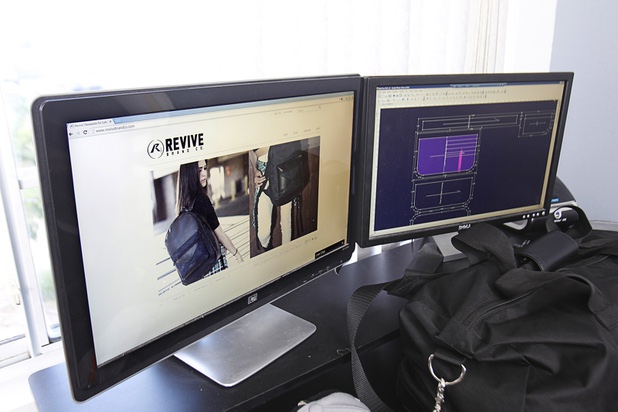 The Revive Brand Co. website is shown on a monitor in their home office Thursday, Dec. 18, 2014.
