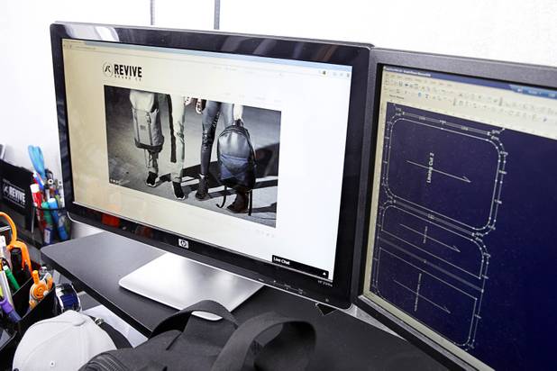 The Revive Brand Co. website is shown on a monitor in their home office Thursday, Dec. 18, 2014.