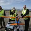 Joe Burns, Scott Carrigan and Dan Johnson of Sensurion Aerospace prepare the Sensurion Aerospace Magpie commercial drone for a flight Friday, Dec. 19, 2014, near Boulder City.