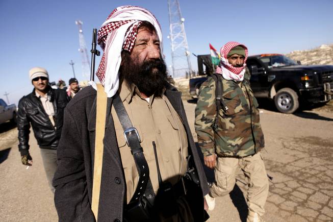 Kurdish fighters face ISIS