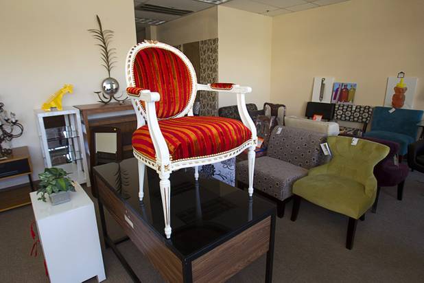 New furniture donated by the World Market Center is shown at the Dinosaurs & Roses thrift shop, 4310 E. Tropicana Ave., is shown at the store Tuesday, Dec. 23, 2014.
