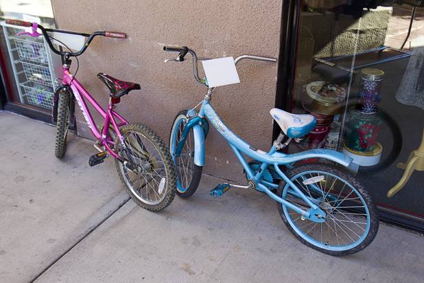 Bicycles are shown outside the nonprofit Dinosaurs & Roses thrift shop, 4310 E. Tropicana Ave., Tuesday, Dec. 23, 2014.