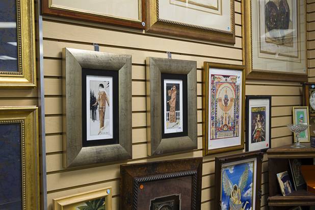 Artwork is displayed at the nonprofit Dinosaurs & Roses thrift shop, 4310 E. Tropicana Ave., Tuesday, Dec. 23, 2014.