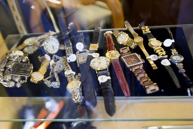Watches are shown in a case at the nonprofit Dinosaurs & Roses thrift shop, 4310 E. Tropicana Ave., Tuesday, Dec. 23, 2014.