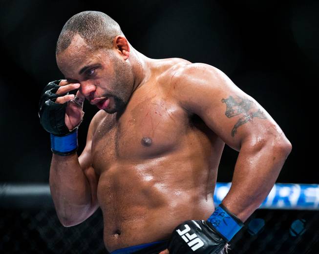 Light Heavyweight Title fighter Daniel Cormier checks his eye after an accidental poke from Jon Jones during  their UFC182 fight at the MGM Grand Garden Arena on Friday, January 2, 2014.