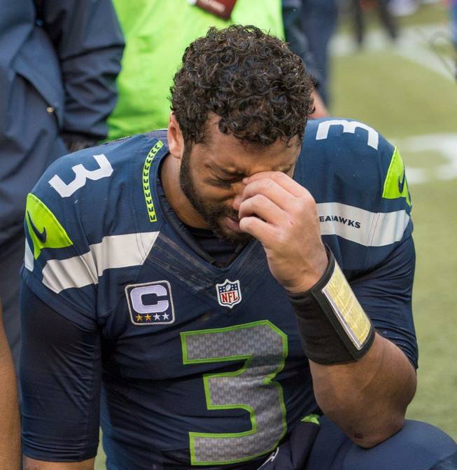The Green Bay Packers vs. Seattle Seahawks in the NFC Championship game Sunday, Jan. 18, 2015, in Seattle. The Seahawks won 28-22 in overtime. Seahawks quarterback Russell Wilson is pictured here.