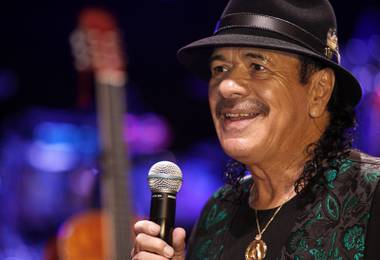 Carlos Santana speaks during a ceremony at House of Blues on Wednesday, Jan. 21, 2015, in Mandalay Bay. Santana and Hermes Music U.S. were honored for their donation of 80 guitars to Monaco Middle School’s music programs.