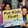 Students Isabel Onisile, 11, and Octavia McKindra, 11, attend a rally at Sierra Nevada Academy Charter School at the National School Choice Week Capitol celebration Wednesday, Jan. 28, 2015, in Carson City.