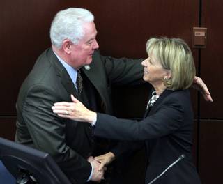 Republican John Hambrick, left, greets Barbara Cegavske, Nevada Secretary of State, during the opening session of the Nevada Legislature in Carson City, Monday, Feb. 2, 2015. Hambrick was elected Assembly Speaker, which is the highest position in the lower house.