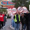 This Oct. 24, 2014, photo shows union members picketing outside the Trump Taj Mahal casino in Atlantic City N.J.