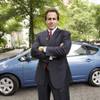 Then-Hertz Chairman and CEO Mark Frissora stands near a Toyota Prius on Thursday, June 14, 2007, in New York. Frissora stepped down in September when the auto-rental company was mired in accounting problems.