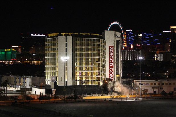The Clarion Hotel and Casino is imploded in the early morning hours Tuesday, Feb. 10, 2015. The hotel, opened in 1970, was once owned by actress Debbie Reynolds and named the Debbie Reynolds Hollywood Hotel. A mixed-use resort, catering to convention-goers, is planned for the site, according to developer Lorenzo Doumani.