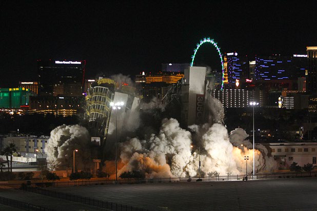 The Clarion Hotel and Casino is imploded in the early morning hours Tuesday, Feb. 10, 2015. The hotel, opened in 1970, was once owned by actress Debbie Reynolds and named the Debbie Reynolds Hollywood Hotel. A mixed-use resort, catering to convention-goers, is planned for the site, according to developer Lorenzo Doumani.