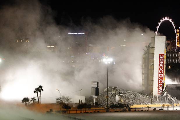 The remains of the Clarion Hotel and Casino are shown after it was imploded early Tuesday morning, Feb. 10, 2015. The hotel, opened in 1970, was once owned by actress Debbie Reynolds and named the Debbie Reynolds Hollywood Hotel. A mixed-use resort, catering to convention-goers, is planned for the site, according to developer Lorenzo Doumani.