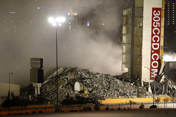 The remains of the Clarion Hotel and Casino are shown after it was imploded early Tuesday morning, Feb. 10, 2015. The hotel, opened in 1970, was once owned by actress Debbie Reynolds and named the Debbie Reynolds Hollywood Hotel. A mixed-use resort, catering to convention-goers, is planned for the site, according to developer Lorenzo Doumani.