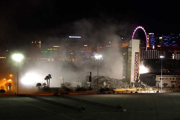 The Clarion Hotel and Casino is imploded in the early morning hours Tuesday, Feb. 10, 2015. The hotel, opened in 1970, was once owned by actress Debbie Reynolds and named the Debbie Reynolds Hollywood Hotel. A mixed-use resort, catering to convention-goers, is planned for the site, according to developer Lorenzo Doumani.
