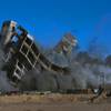 The Gramercy real estate project implodes its nine-story residential tower Sunday, Feb. 15, 2015.