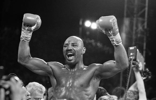 “Marvelous” Marvin Hagler lets out a yell and throws his arms up in victory after knocking out Thomas “Hitman” Hearns on April 15, 1985, in Las Vegas. Hagler knocked out Hearns in the third round of their fight to win the world middleweight championship.
