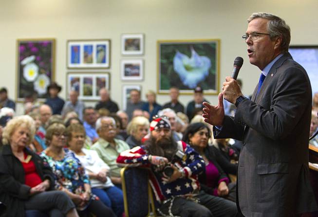 Former Florida Gov. Jeb Bush speaks to residents during a discussion and question and answer session at the Mountain Shadows Community Center in Las Vegas Monday, March 2, 2015.