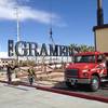 Workers with Nevada Sign prepare to hoist part of a 90-foot sign at the Gramercy mixed-use development Tuesday, March 3, 2015.
