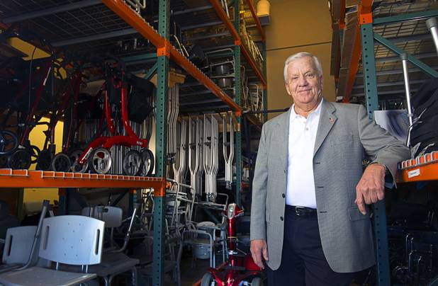 Favil West, co-founder and president of the Foundation Assisting Seniors, poses in the charity's equipment storage warehouse in Sun City Anthem Tuesday, March 10, 2015. The nonprofit organization is dedicated to improving the quality of life for seniors.