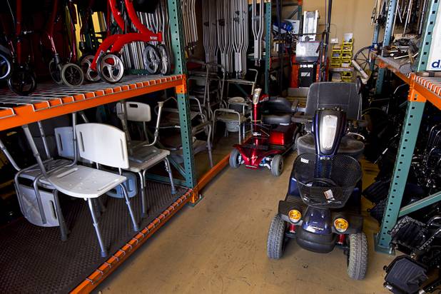Equipment, including motorized scooters, center, is shown in the the Foundation Assisting Seniors' storage warehouse in Sun City Anthem Tuesday, March 10, 2015. The nonprofit organization is dedicated to improving the quality of life for seniors.