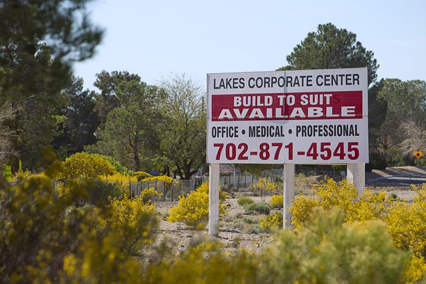 A sign is shown by Citibank's former credit-card processing center, 8725 W. Sahara Ave. Tuesday, March 10, 2015. The building is empty for the first time in three decades.
