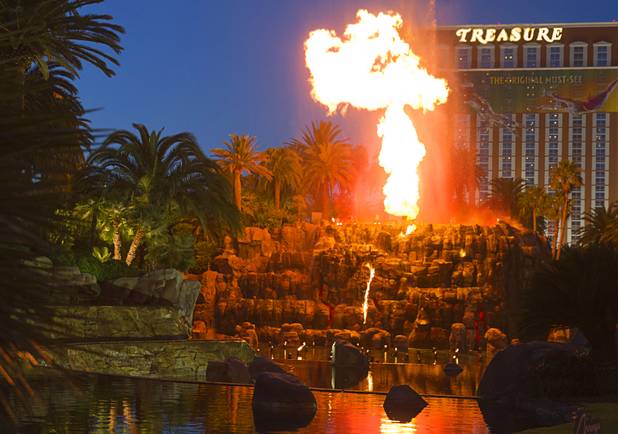 The volcano erupts Friday, March 13, 2015, in front of the Mirage.