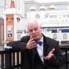 This Wednesday, March 11, 2015, photo shows Mayor Don Guardian on Atlantic City's Boardwalk — the most valuable spot on the Monopoly board game. The game turns 80 years old on March 19, 2015. 