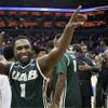 UAB guard Denzell Watts acknowledges the fans as his team and he celebrate their win over Iowa State in an NCAA tournament second-round basketball game in Louisville, Ky., on Thursday, March 19, 2015. UAB won the game 60-59. 