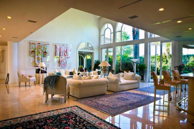 Tall ceilings and lots of windows are features in the home of Jack and Laura Sommer which is currently on the market for $7.95 million in the Spanish Trail Country Club on Friday, March, 20, 2015.