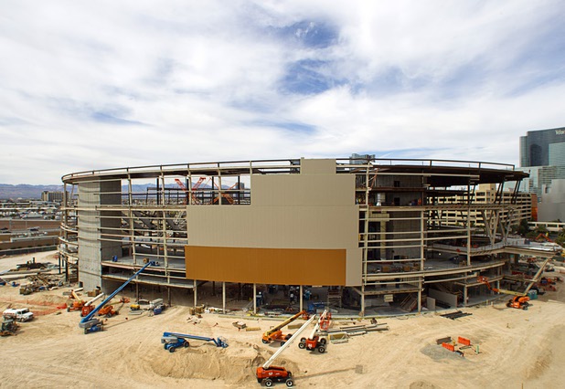 Construction continues on a $375 million sports arena between New York-New York and the Monte Carlo casinos Sunday, March 22, 2015. The 20,000-seat arena, a collaboration between MGM Resorts International and AEG, is expected to open in spring 2016.