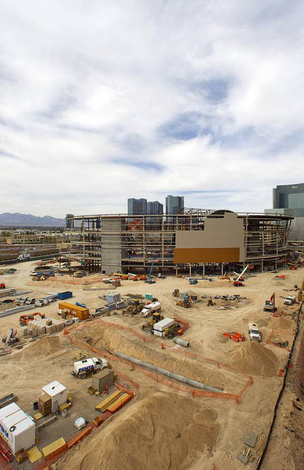 Construction continues on a $375 million sports arena between New York-New York and the Monte Carlo casinos Sunday, March 22, 2015. The 20,000-seat arena, a collaboration between MGM Resorts International and AEG, is expected to open in spring 2016.