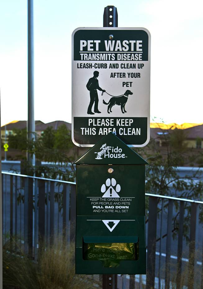 A sign at Vantage Lofts in Henderson encourages tenants to clean up after their pets.