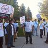 Demonstrators protest against ride-hailing company Uber in Carson City on Monday, March 30, 2015.