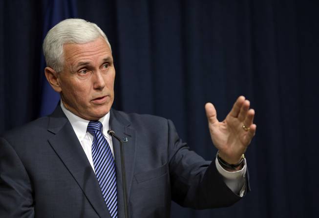 Indiana Gov. Mike Pence holds a news conference at the Statehouse in Indianapolis, Thursday, March 26, 2015.