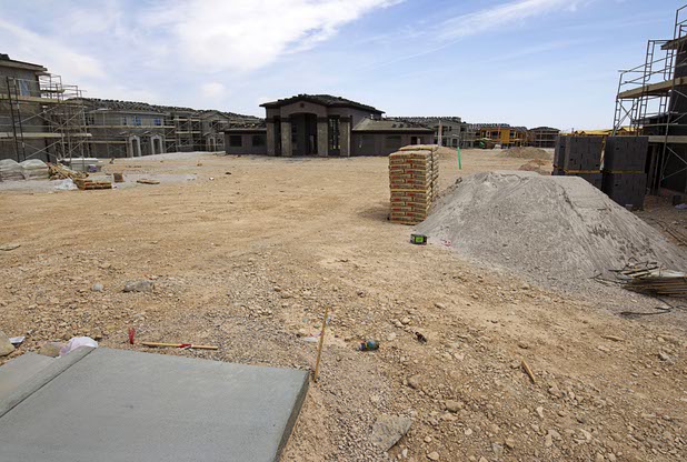 A view of an apartment complex under construction at Peace and Hualapai ways in the Southwest valley Sunday, April 5, 2015.